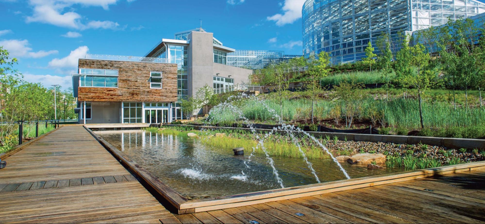 Building with sustainable features and water elements.