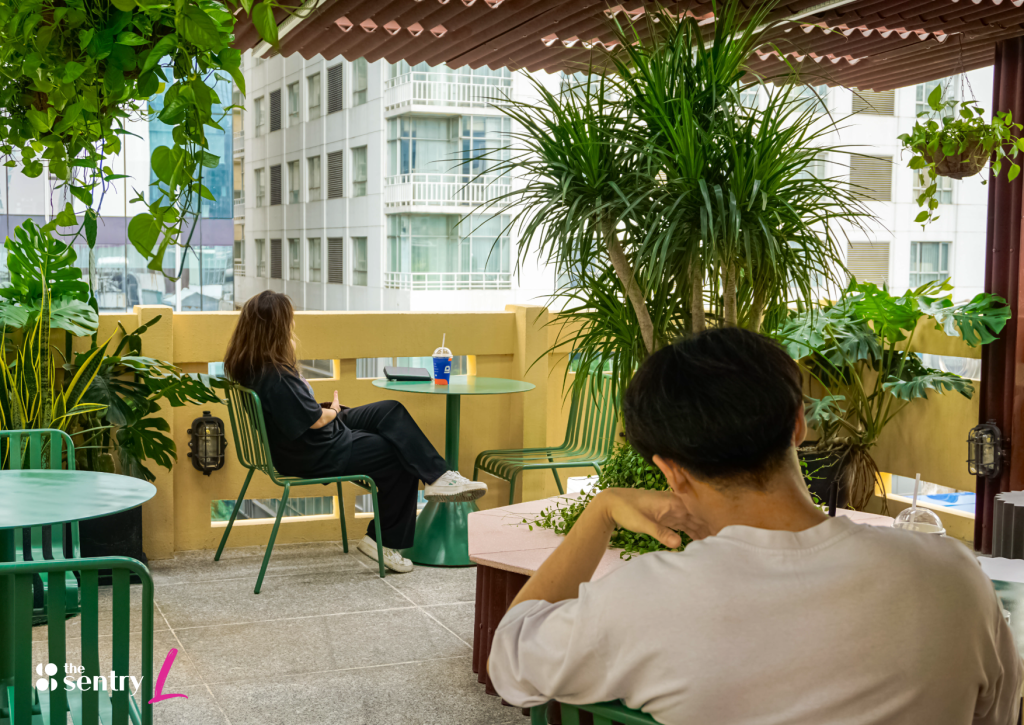 Communal workspace at The Sentry L with desks and cozy seating areas