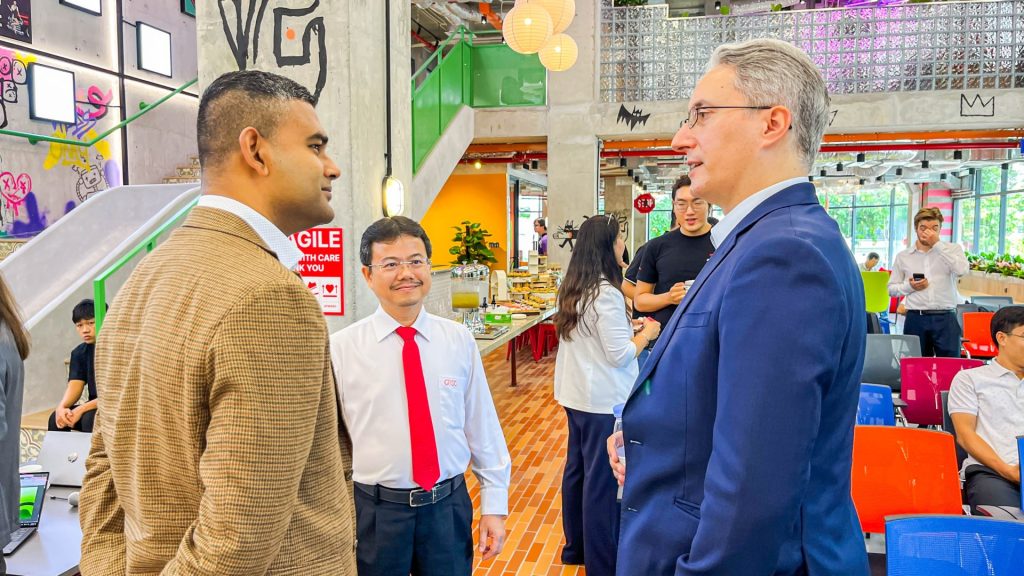 Founders engaging in a networking event or workshop. 