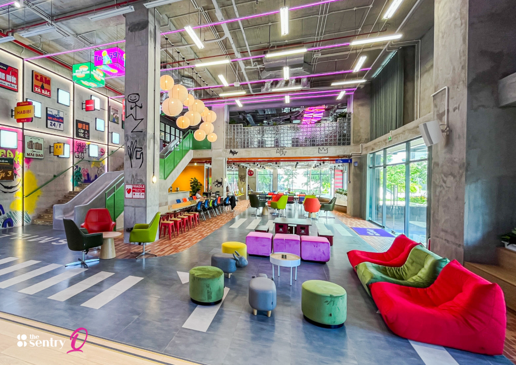 A vibrant common area in The Sentry coworking space with stylish and comfortable furniture. 