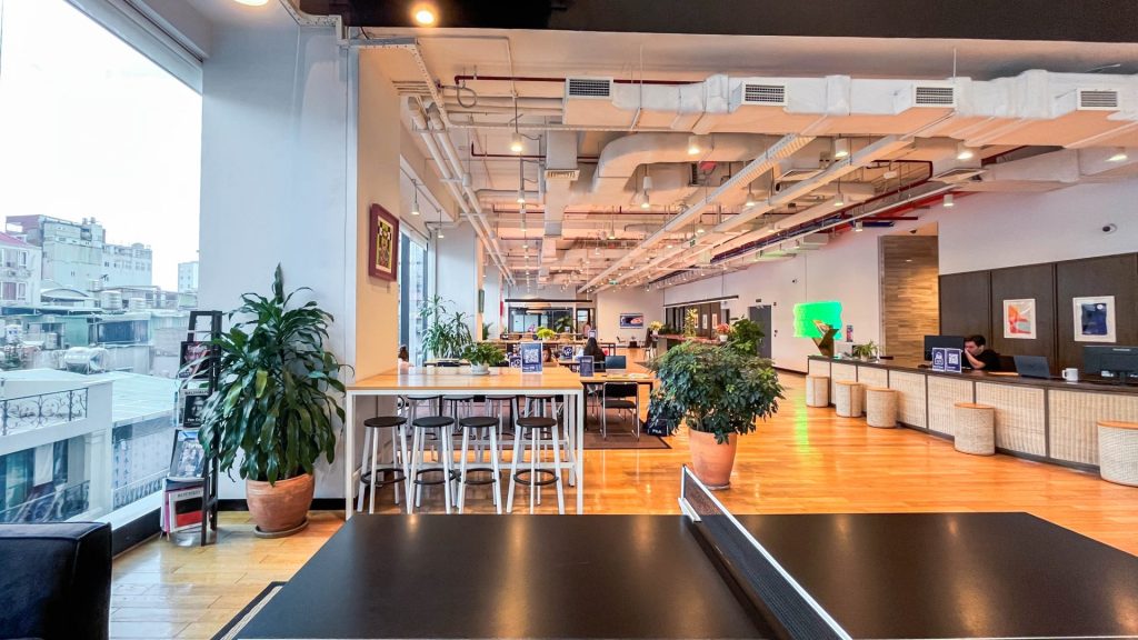 Various workspaces at The Sentry: desks, booths, lounge chairs.