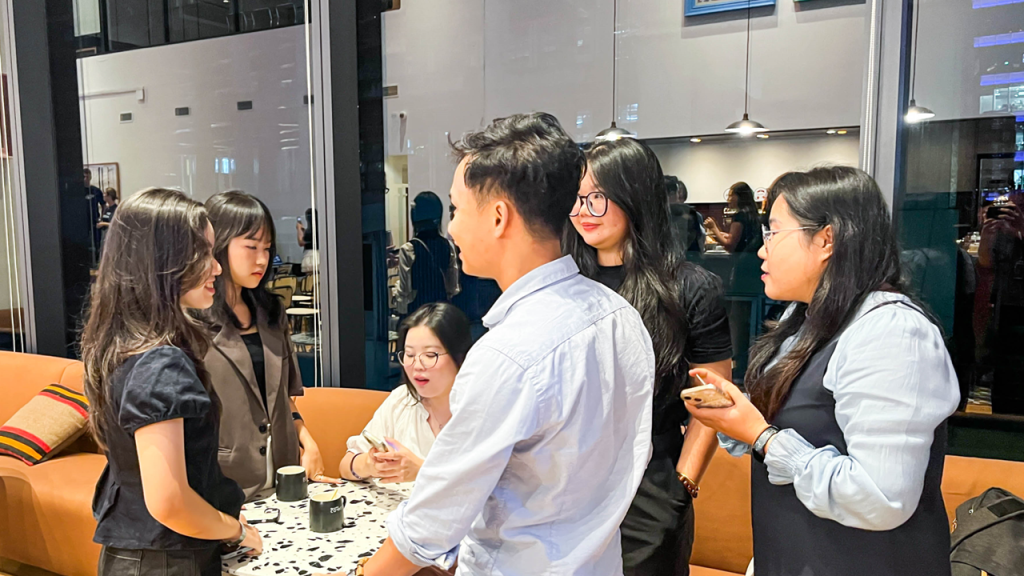 Team members celebrating in The Sentry’s modern pantry area.