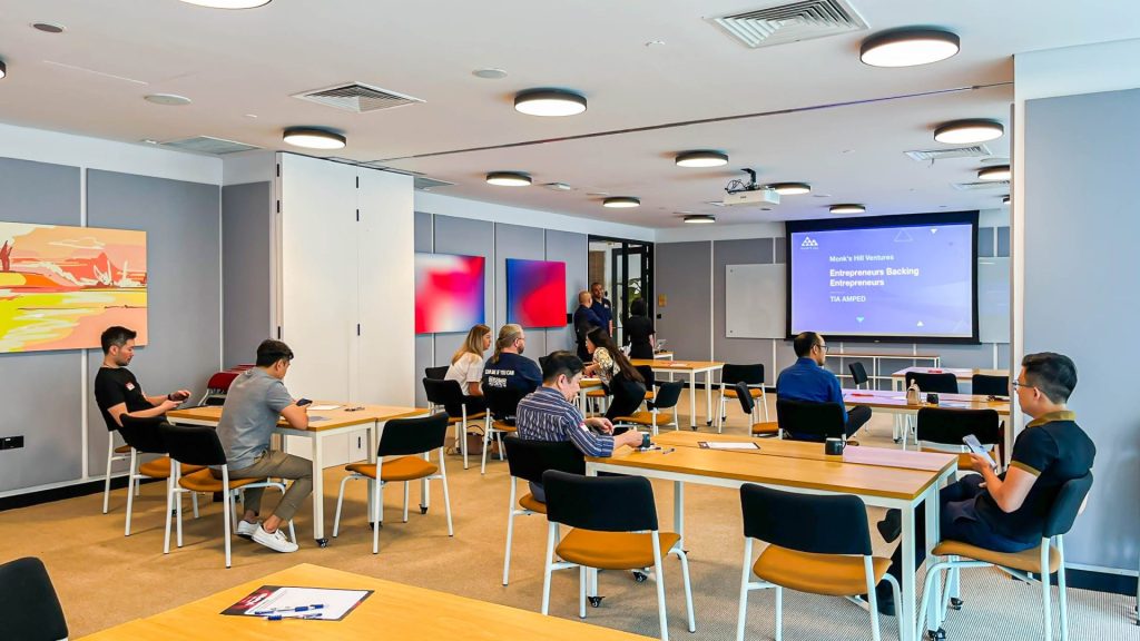 A professional team working together in a Sentry conference room.