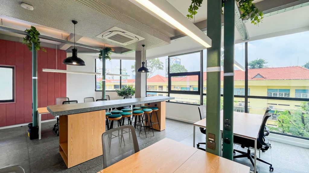  Diverse team collaborating in a bright, open-plan rented office.