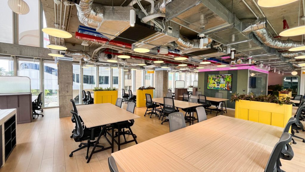 A glass-walled private office.