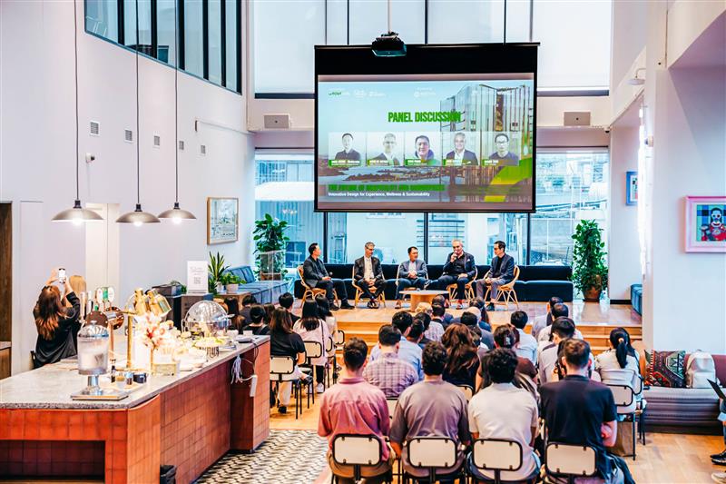Stylish, modern open-plan workspace with greenery and natural light.