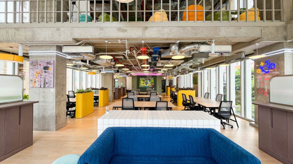 Bright workspace featuring indoor plants and greenery.