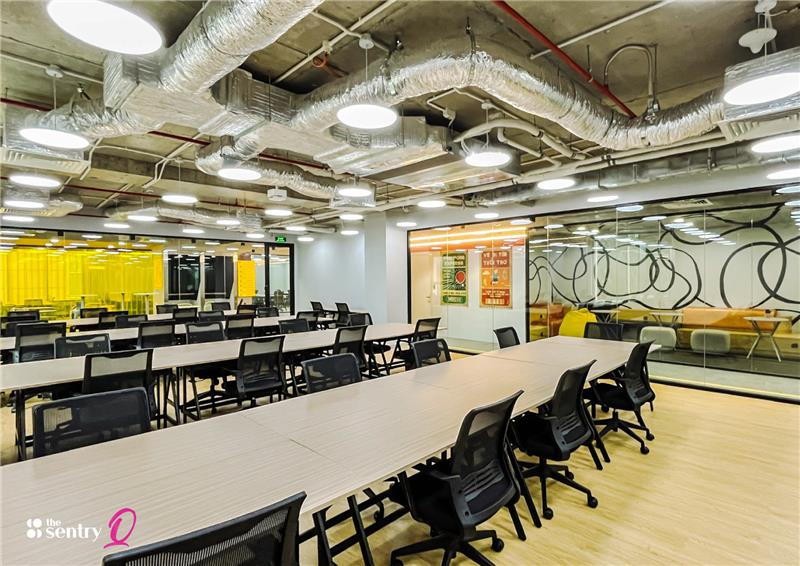 Private office suite with glass walls and natural light.