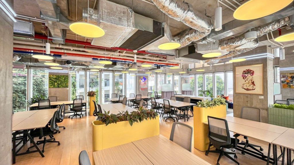 A vibrant open-plan area at The Sentry featuring flexible hot desks