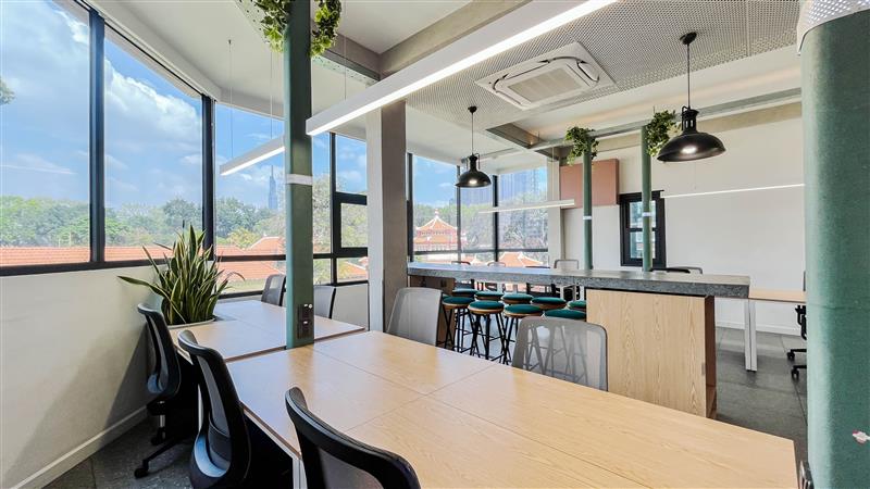 A glass-walled private office suite at The Sentry.