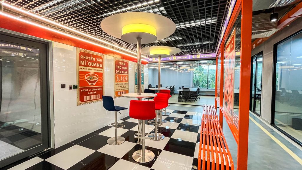 A beautifully designed, premium coworking reception area with welcoming staff and upscale decor.