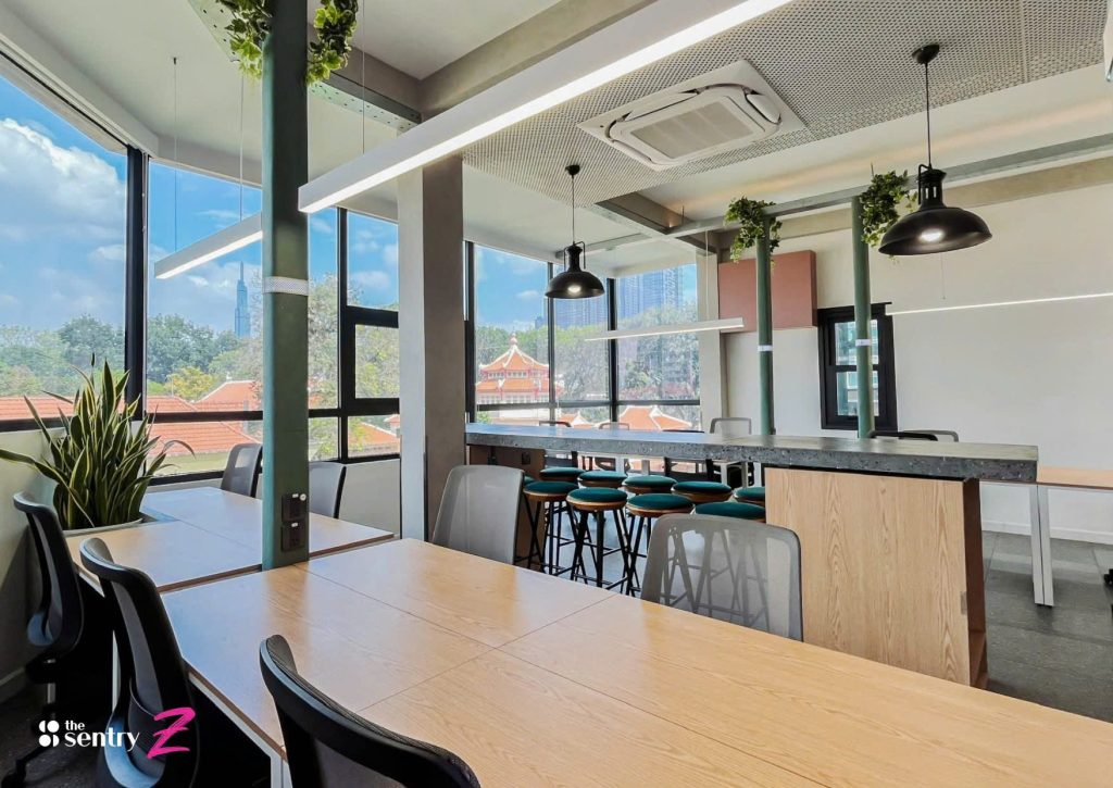 Creative, relaxed coworking lounge area with modern decor and indoor plants.