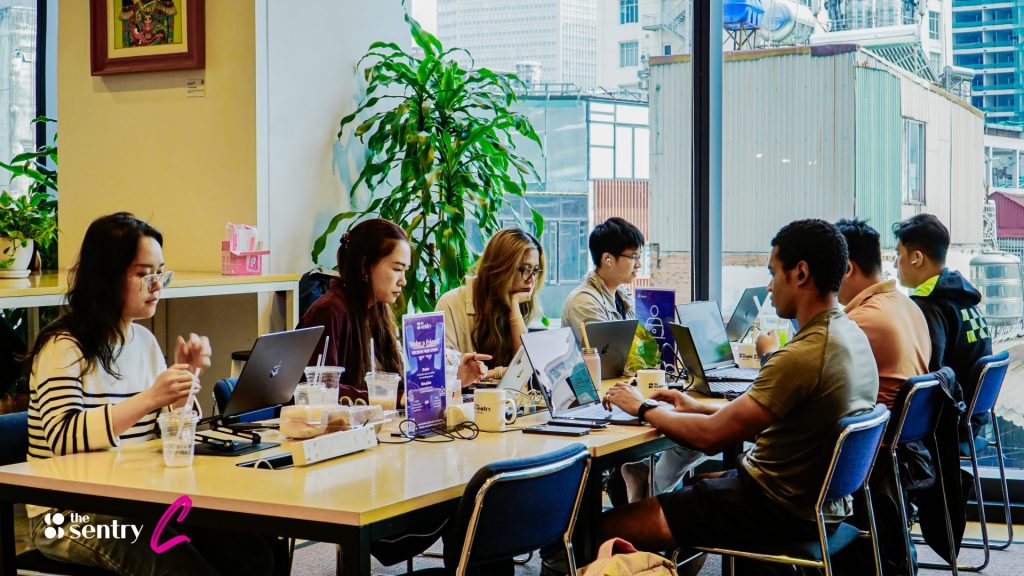 Rows of workstations in a well-lit flexible office