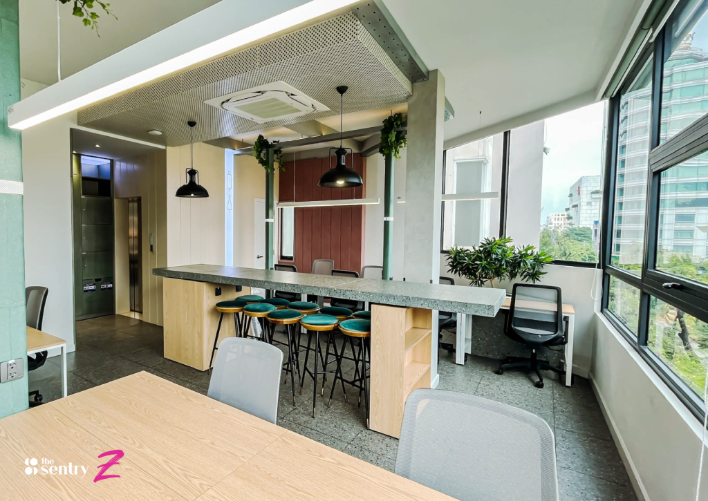 A private serviced office at The Sentry with a small team working around a shared table