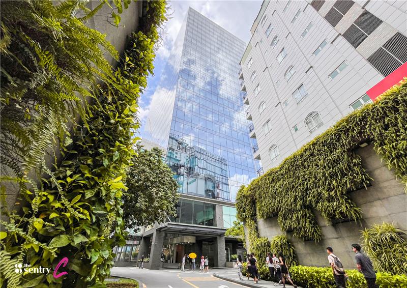 Exterior or lobby of a The Sentry commercial building in District 1.