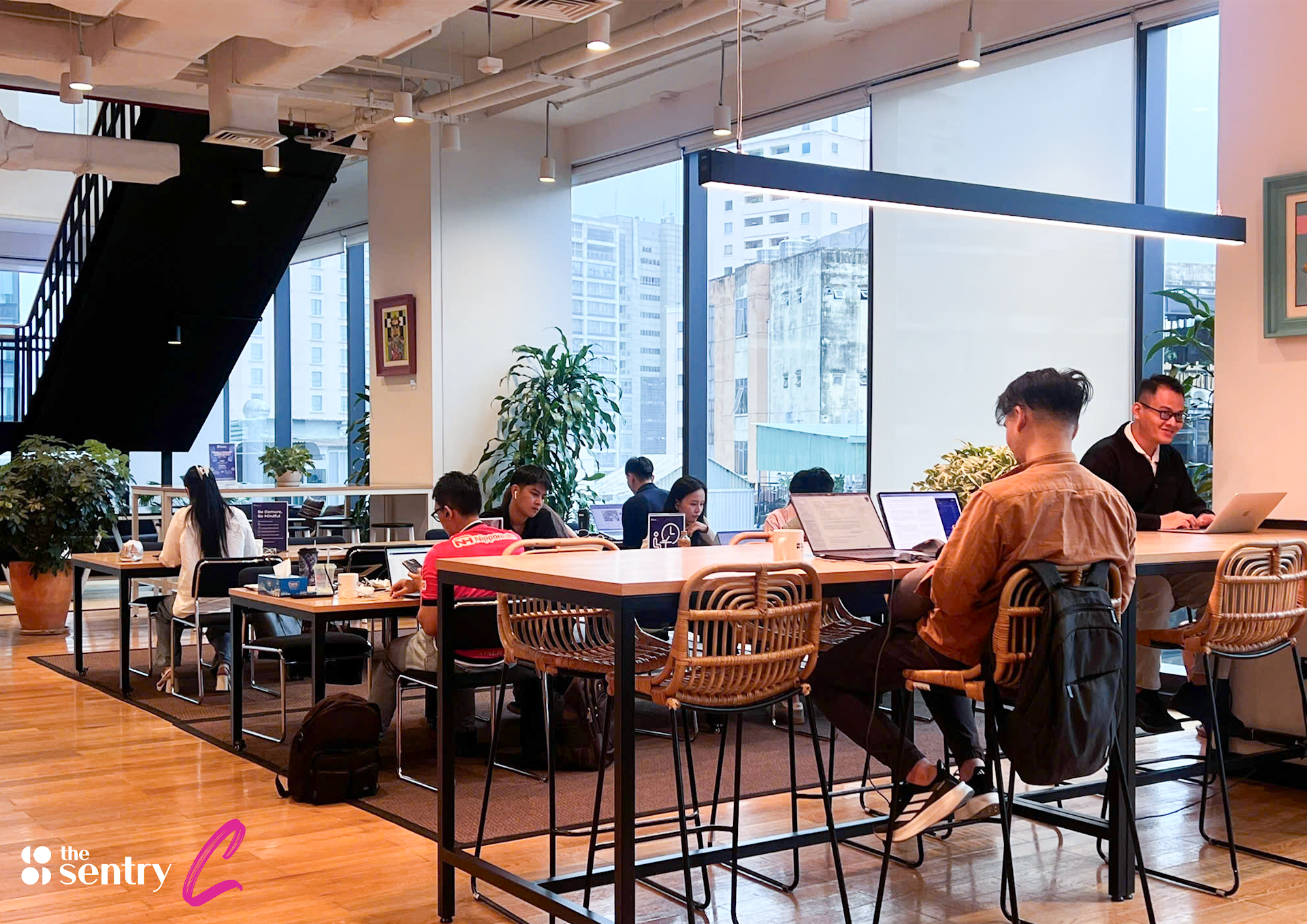 Bright open workspace with rows of desks at The Sentry coworking space in Ho Chi Minh City