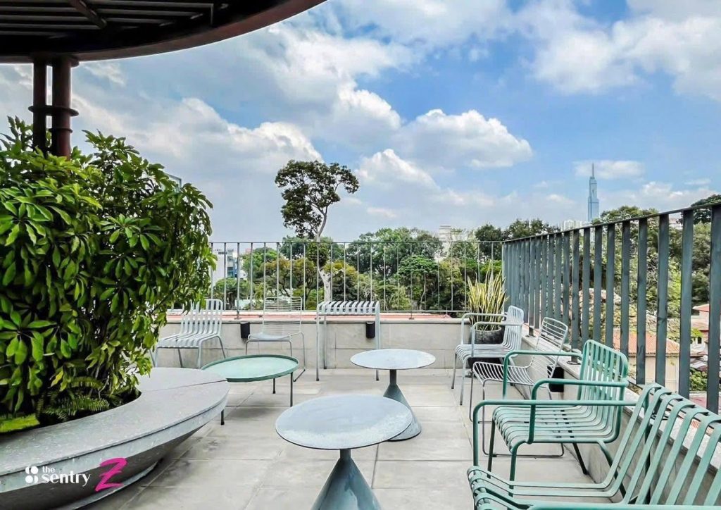 Outdoor terrace with plants and seating at The Sentry Z
